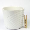 Witte bloempot met motief
