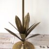 Hoge kandelaar met blad