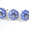 3 blauw/witte knoppen