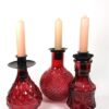 3 roze flesjes + kaarshouders