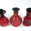 3 roze flesjes + kaarshouders