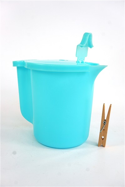 Vintage Tupperware schenkkan blauw